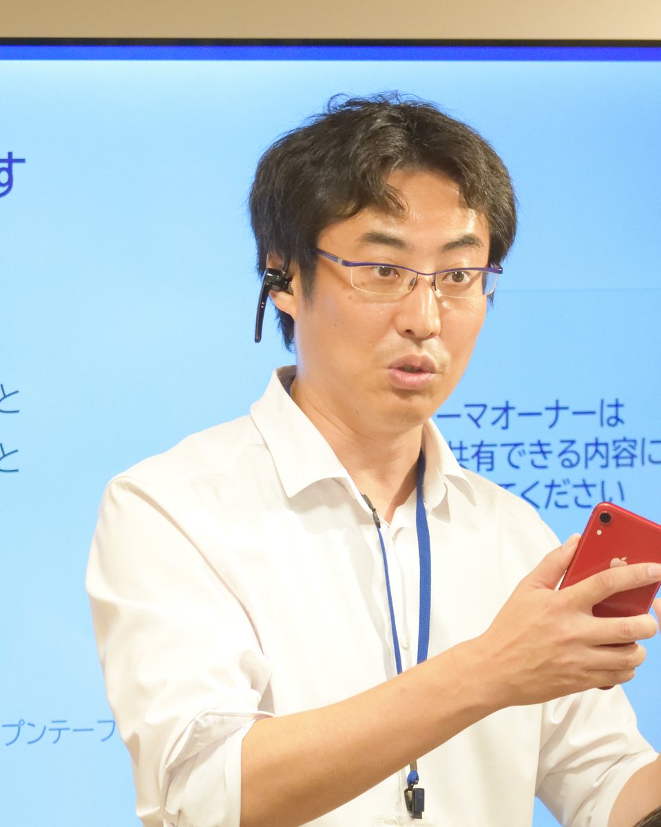 石坂保人。2026年9月14日、HAGUKUMI2026キックオフイベントで、テーマ別対話のあとの「次の一歩」の整理で話している